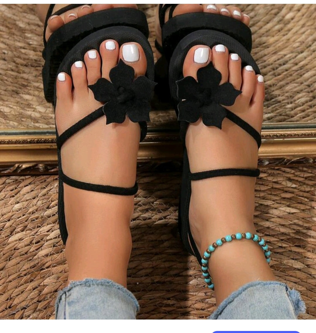 Size 9 Black slipper with a flower